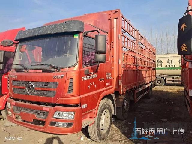 转让二手8.6米高栏载货车 前四后四 240马力